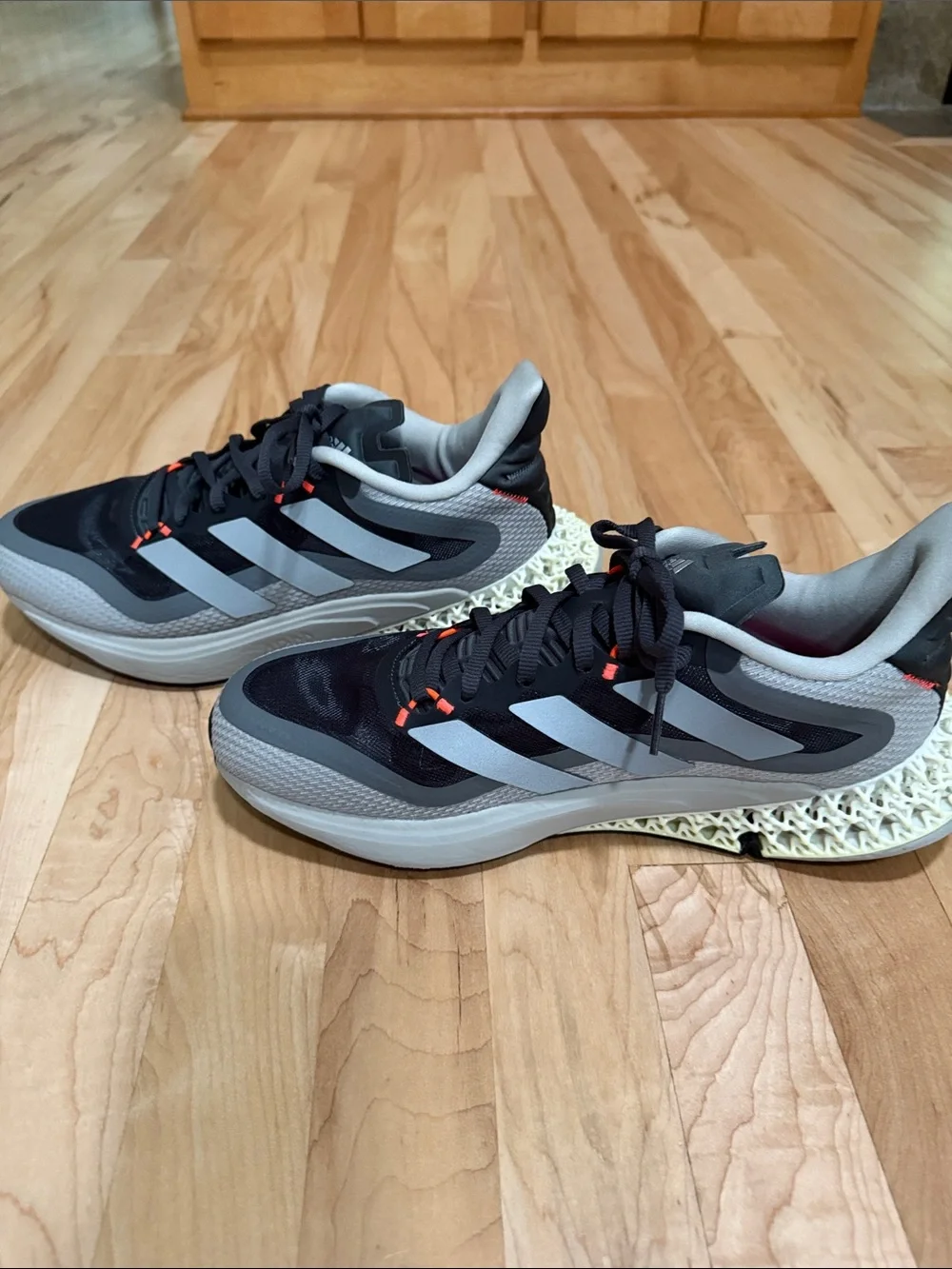 adidas Men's 4DFWD PULSE Grey, Black and White Sneakers with Coral Accents